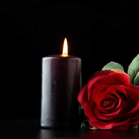 dark-candle-with-red-rose