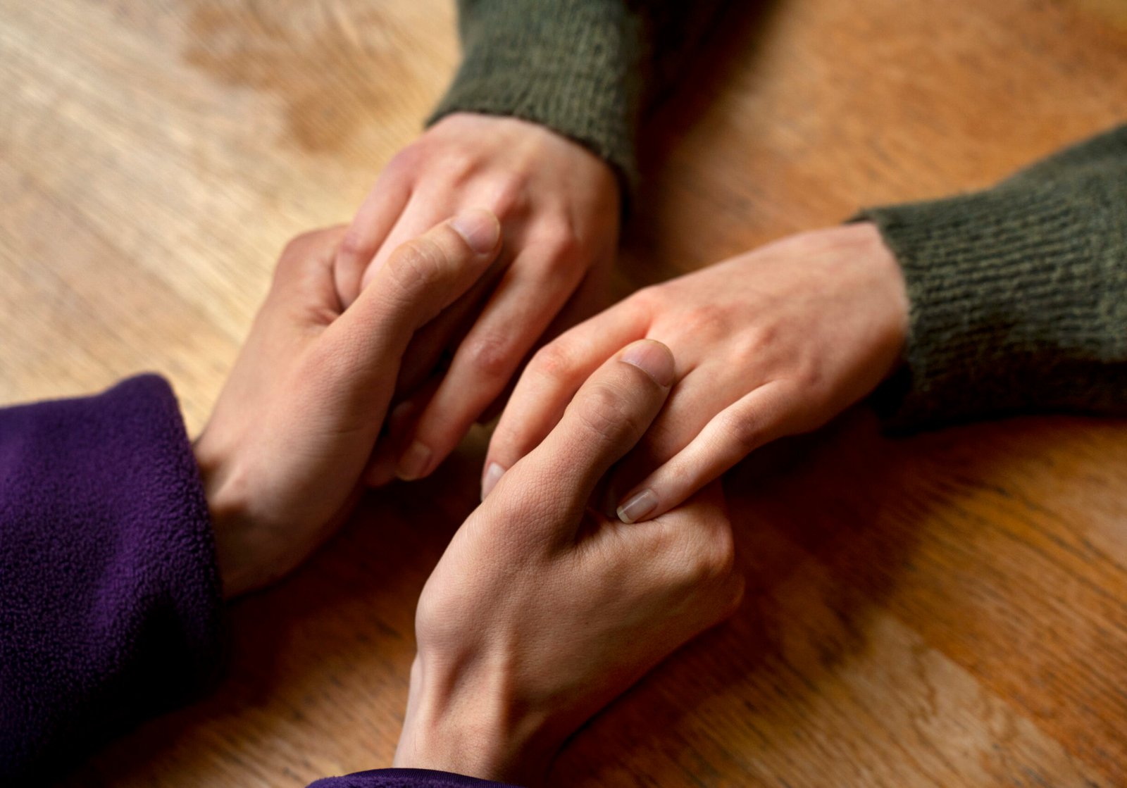 hands-holding-each-other-support